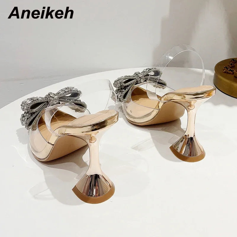 Aneikeh 2026 Fashion Crystal Sequined Bowknot Women Pumps Sexy Pointed Toe High Heels PVC Transparent Sandals Wedding Prom Shoes