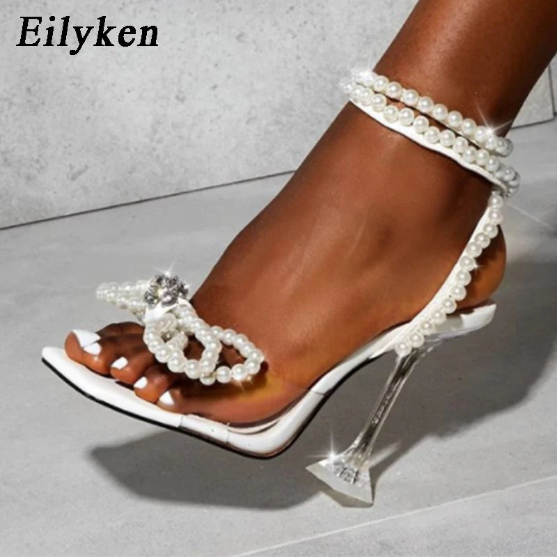 Eilyken New Women Sandals 2025 Summer Sexy Perspex Crystal High Heels Party Wedding Shoes Square Toe Pearls String Bowknot Pumps