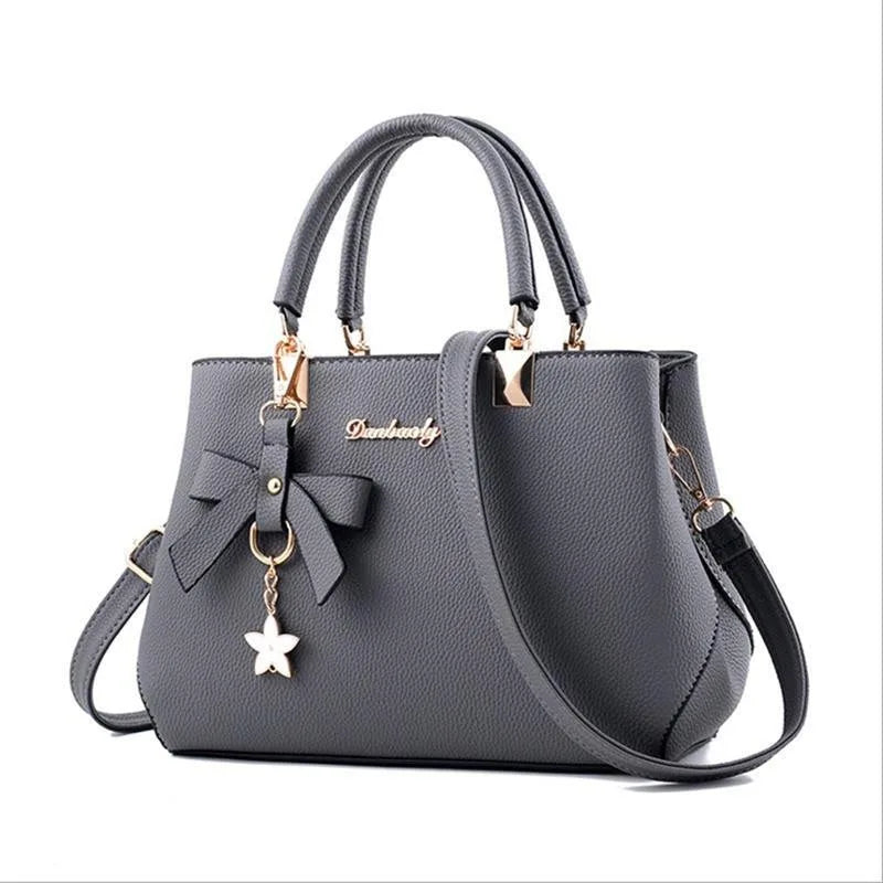 Elegant Women Messenger Bags with flower pendant Office Ladies Totes Pure Handbag for female Crossbody Shoulder Bags.