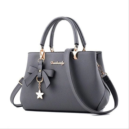 Elegant Women Messenger Bags with flower pendant Office Ladies Totes Pure Handbag for female Crossbody Shoulder Bags.