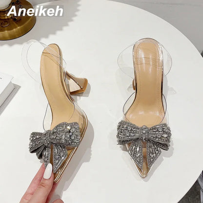 Aneikeh 2026 Fashion Crystal Sequined Bowknot Women Pumps Sexy Pointed Toe High Heels PVC Transparent Sandals Wedding Prom Shoes