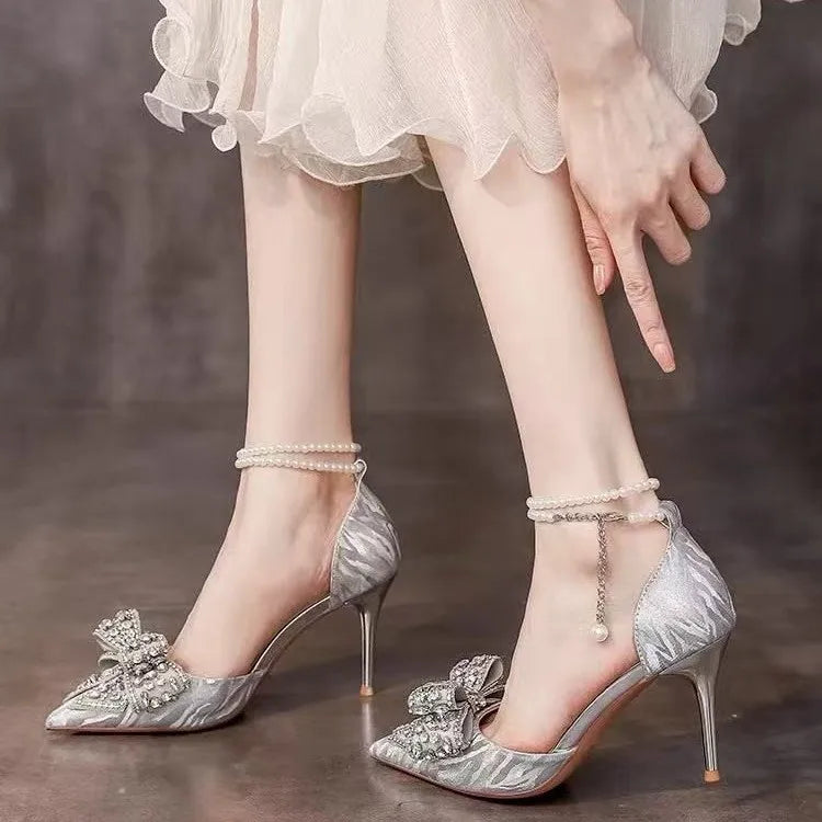 Crystal high-end feel, water diamond bow one-button high heels, women's pointed toe thin heels, silver wedding shoes