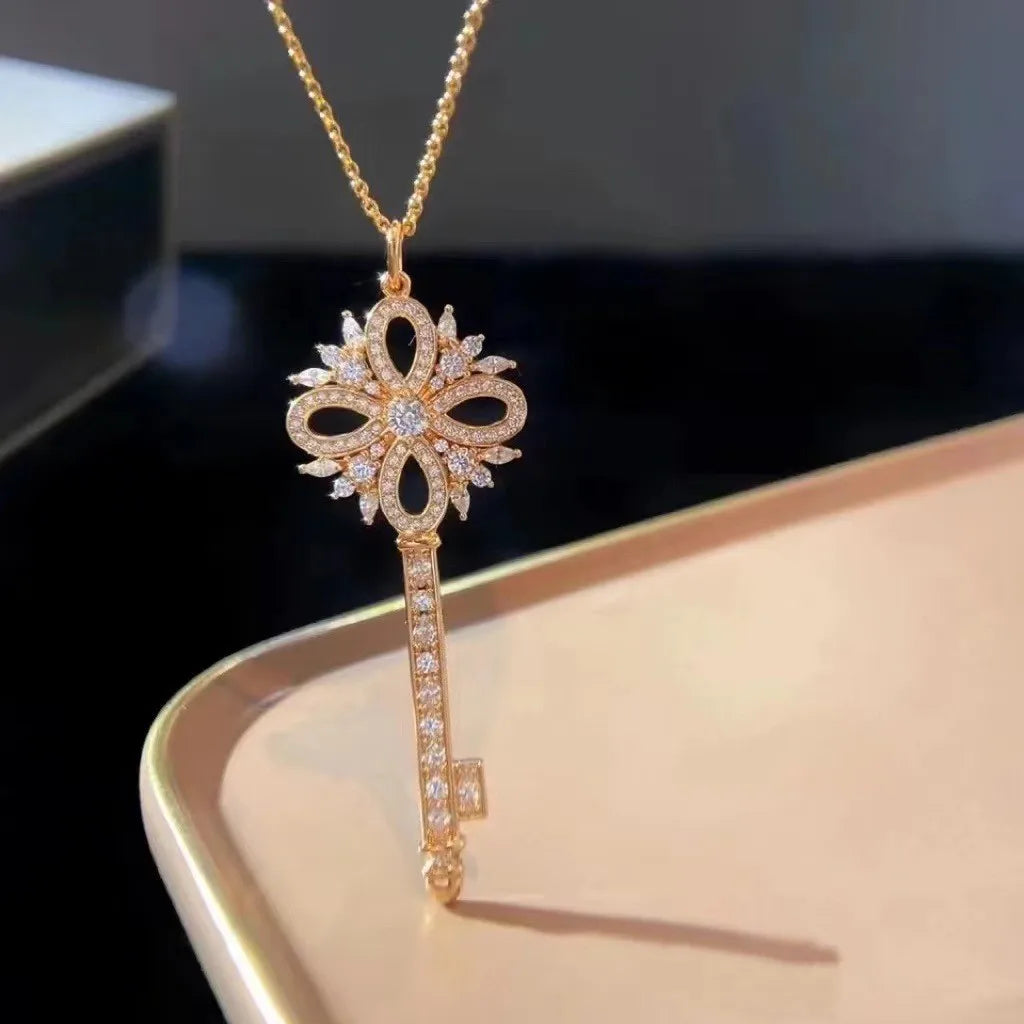 Golden Snowflake Key Pendant Necklace Female Hollow Clover Diamond Set Chain Sweater Chain
